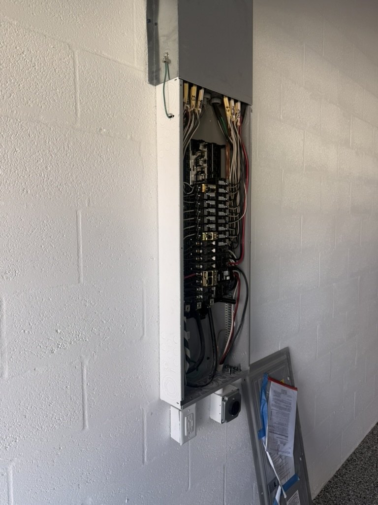 Open Siemens panel where the Tesla charger circuit is landed among the breakers