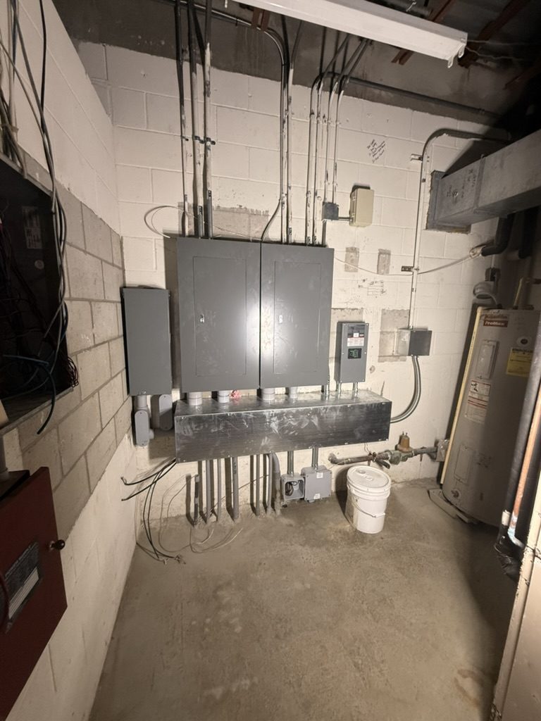 Wide view of the new Square D equipment in the electrical room