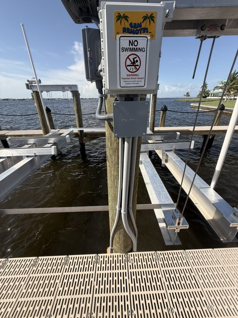Conduits running down the piling from the GEM Remotes control box