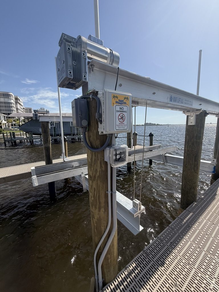 GEM Remotes control box with a No Swimming sign and dock outlets, wide view