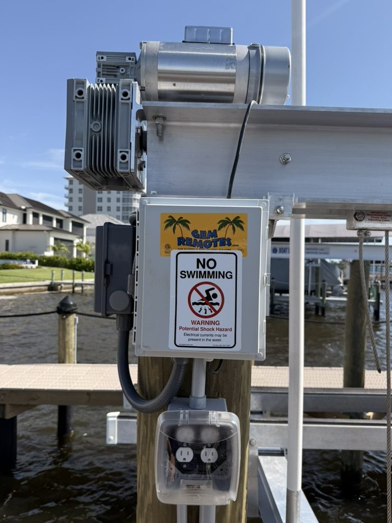 GEM Remotes control box with No Swimming sign, close-up