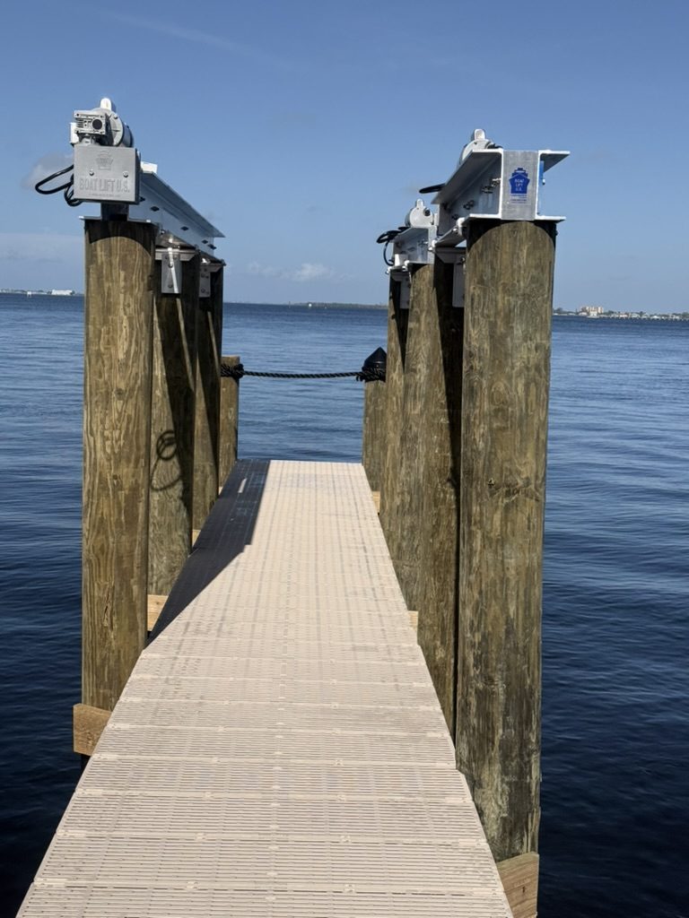 Boat lift beams and motors before wiring