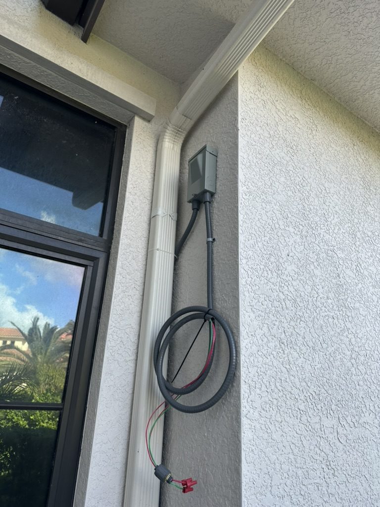 Exterior disconnect location with a flexible conduit whip left for the mini split installer