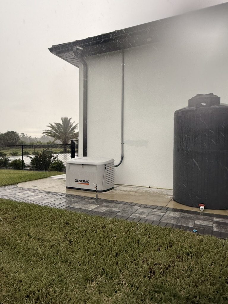 Generac 26 kW generator installed on the side of the home