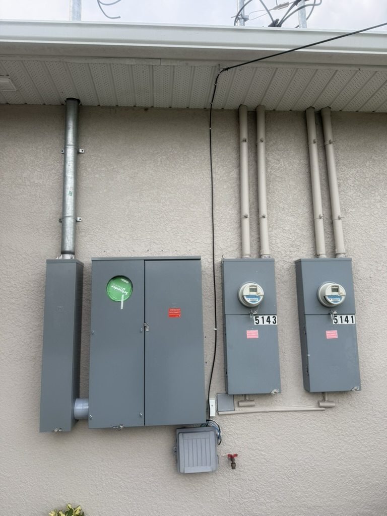 New Square D meter main installed beside the two existing meters