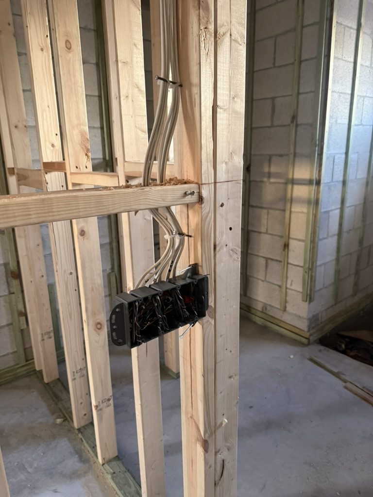 Multi-gang box with cables run through the studs