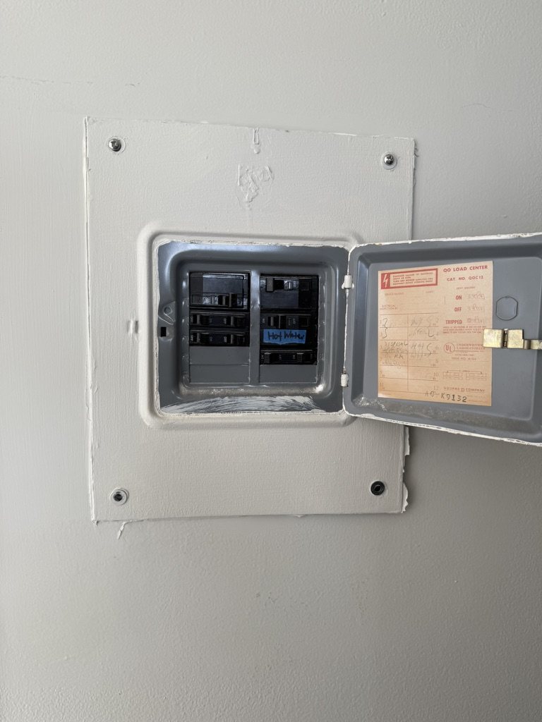Old Square D QO panel with original breakers in a condo unit